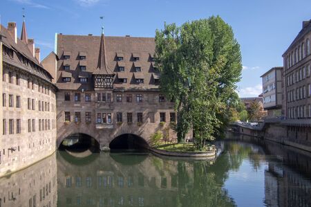 Nuremberg / GERMANY - September 17, 2018: Heilig-Geist-Spital, Hospice of the Holy Spirit beautiful...