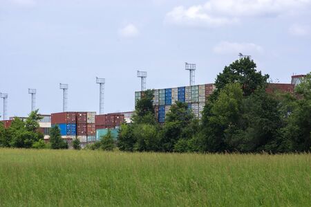 Pardubice / CZECH REPUBLIC - June 23, 2019: Logistic center on green meadow looks like big colorful...