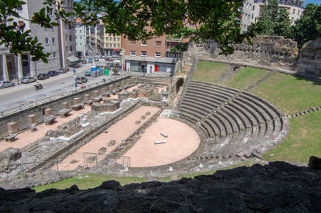 Trieste / ITALY - June 23, 2018: View of Roman theatre of Triest ruins at the foot of San Giusto hill, made of stone with stage made of woodのeditorial素材