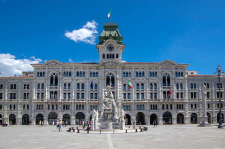 Trieste / ITALY - June 23, 2018: Unity of Italy Square italian Piazza Unita d'Italia and beautiful building of City hall during late touristic season, beautiful town with historic buildingsのeditorial素材