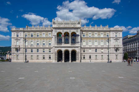 Trieste / ITALY - June 23, 2018: Unity of Italy Square italian Piazza Unita d'Italia with government palace in sunlight during late touristic season, beautiful town with historic buildingsのeditorial素材