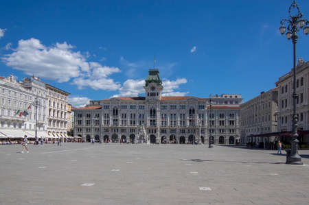 Trieste / ITALY - June 23, 2018: Unity of Italy Square italian Piazza Unita d'Italia and beautiful building of City hall during late touristic season, beautiful town with historic buildingsのeditorial素材