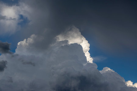 Heavy clouds background, blue, gray and white dramatic sky before coming big storm and rain