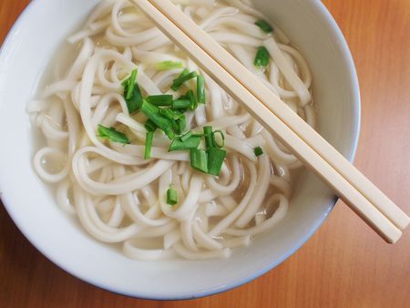 Chinese style noodles with a pair of chopsticksの写真素材