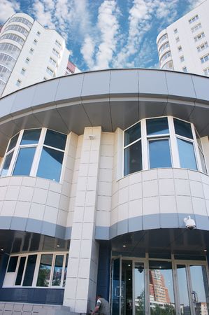 Office of ... Bank, Novosibirsk branch, and blue cloudy sky
