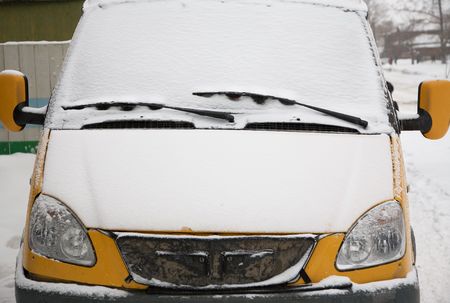 Snow covered car. After snowstorm. Novosibirsk, january 2007の写真素材