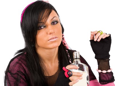 EMO girl with bottle in depressionの写真素材