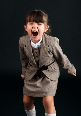 Little fashion model  posing in studio.の写真素材