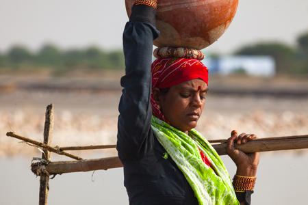 Indian woman with clay potのeditorial素材