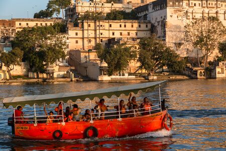 Boat at sunset on Lake Picholaのeditorial素材