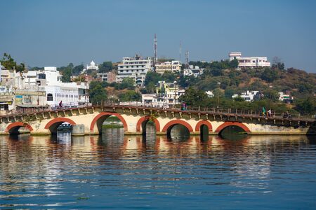 Pichola lake and old bridge in Udaipurのeditorial素材