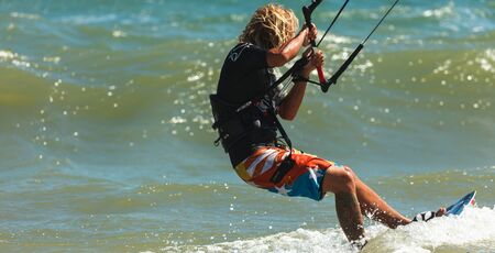 Riding on the board in the ocean