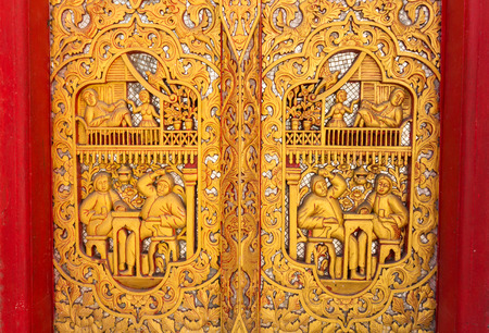 thai sculpture Patterns on the wood wallsの写真素材