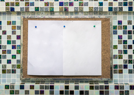 blank memo board on the texture wood with Mosaic backgroundの写真素材