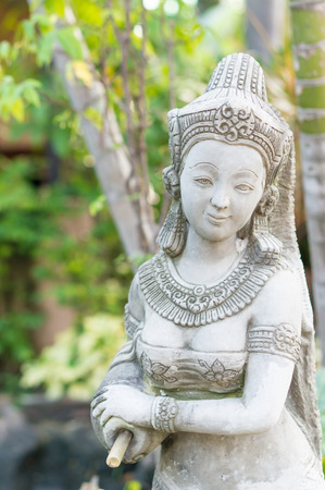 Girl statue of ancient , background out of focusの写真素材