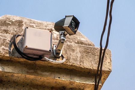 CCTV cameras installed at the wall, background out of focusの写真素材
