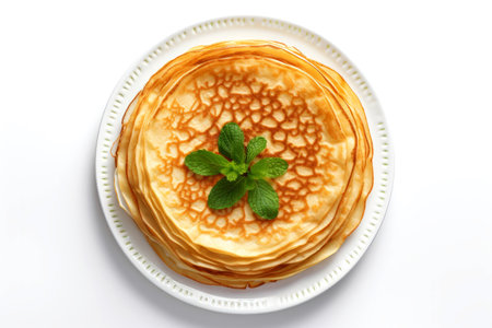 Plate with tasty pancakes and mint on white background, top viewの素材