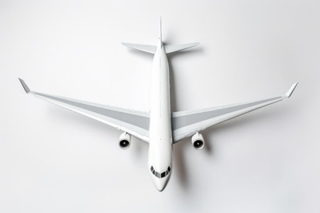 Airplane model isolated on white background. Travel concept. Top view.の素材