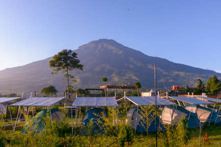 Photovoltaic solar panels installed on the roof of a mountain.の写真素材