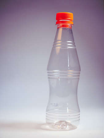 Plastic bottle on a white background. Selective focus.の写真素材