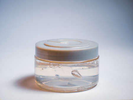 glass jar on a white background close-upの写真素材