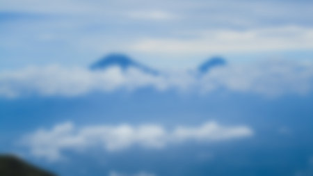 Blurred landscape blue sky with clouds, beautiful fantasy pastel colorful landscape background,...
