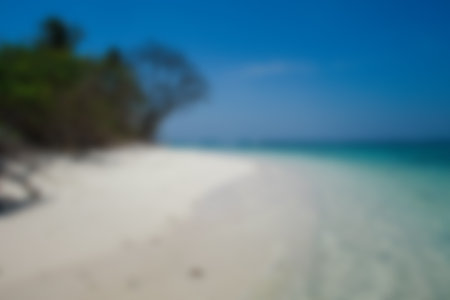 Blurred background, view tropical beach with sun light wave abstract background. Travel concept.の写真素材