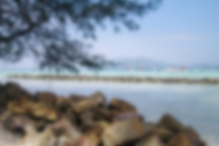 Blurred background, view tropical beach with sun light wave abstract background. Travel concept.の写真素材
