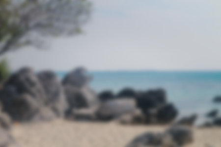 Blurred background, view tropical beach with sun light wave abstract background. Travel concept.の写真素材