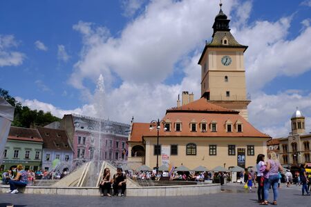 BRASOV, TRANSYLVANIA, ROMANIA - around July 2018: Central square in Old Town. Brasov is charming antique town located at the foot of the Carpathians.の写真素材