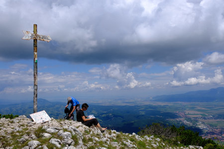 ROMANIA, ROMANIAN CARPATHIANS - around July 2018: Resting tourists on the ridge of the Piatra Craiului mountain rangeのeditorial素材