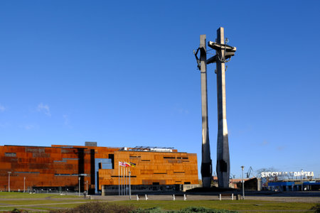 Gdansk, Poland - circa March 2020: Building of the European Solidarity Center and Monument to the Fallen Shipyard Workers (Monument to the Three Crosses) on Solidarity Square in Gdanskのeditorial素材