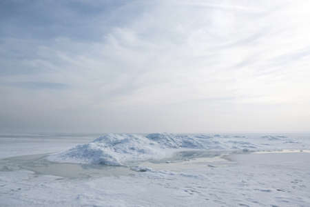 Beautiful scenery of frozen sea in delicate light. Baltic Sea, Puck Bay, Polandの写真素材