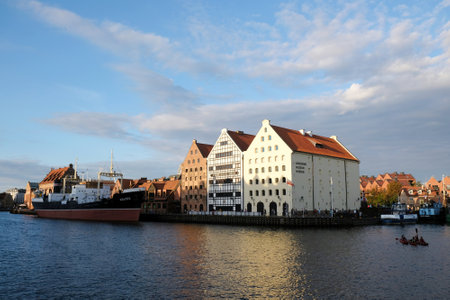Gdansk, Poland - circa July 2020: Olowianka Island with the building of the Baltic Philharmonic and...