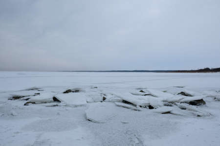 Winter seaside landscape - beach and frozen Baltic Sea near Mikoszewo, Zulawy Wislane, Polandの写真素材