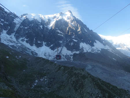 Aiguille du Midi, France - circa July 2016: Cable car on Aiguille du Midi, peak in Alps in moutain massif Mont Blanc. During trekking Tour du Mont Blanc.のeditorial素材