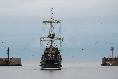 Sailing ship enters the portの写真素材