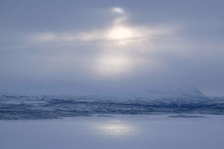 Lake TornetrÃ¤sk (Tornestrask) around Abisko National Park (Abisko nationalpark) in very misty winter scenery. Sweden, Arctic Circle, Swedish Laplandの写真素材