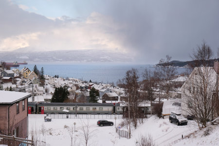 The Norwegian port city of Narvik in winter scenery. Traditional buildings of the city.