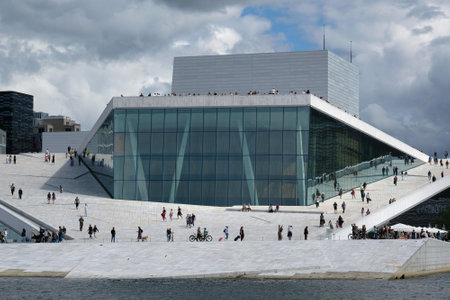 Norway, Oslo - July 25, 2023: View on a side of the National Oslo Opera House. Symbol of capital...