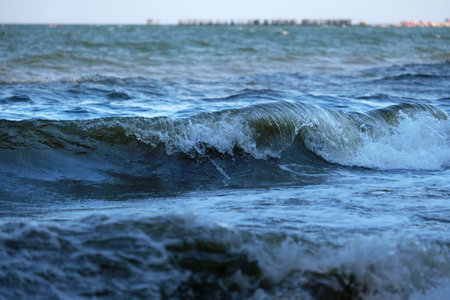 Close-up of a breaking wave in the sea