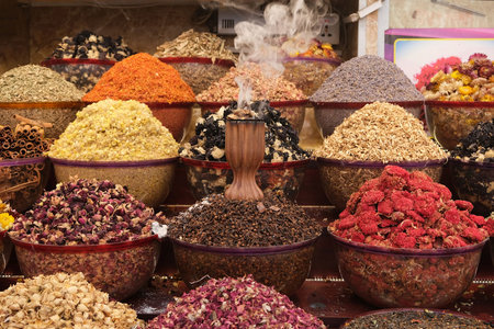 A lot of dry colorful cooking ingredients in bazaar in Deira, Dubai, UEAの写真素材
