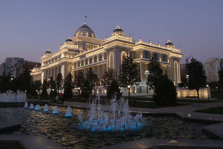 Dushanbe, Tajikistan - Scenery of center of Dushanbe, capital of Tajikistan. New building of the Parliament of Tajikistan with evening illuminations.の写真素材