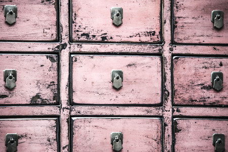 Vintage background. Wooden purple drawers.の写真素材