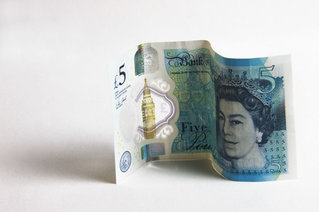 Five pound sterling plastic bank noteの写真素材