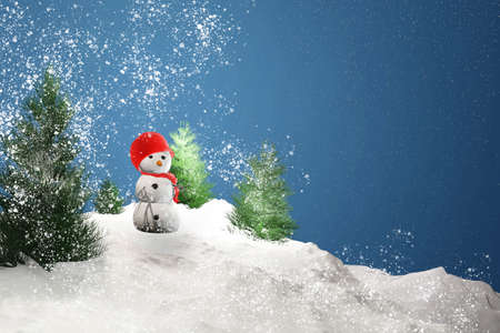 Christmas background. Snowman in the snow.の写真素材