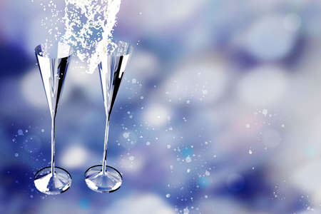 New Year background with champagne glasses and firework display on black background. Happy New Year.の写真素材