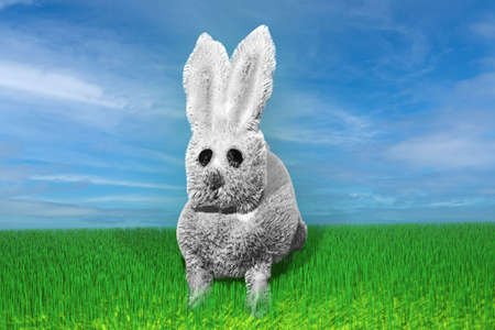 Easter background. Baby rabbit in the grass. 3D render illustration.の写真素材