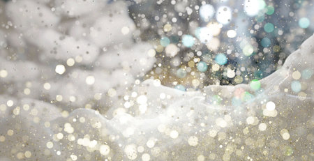 Christmas winter background with snowfall and falling snow in the mountains. Copy space for promotion. Abstract blurred snowflakes with lights. 3D render illustration.の写真素材