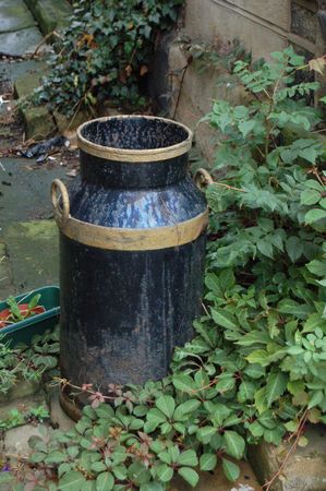 Painted Milk Urn in alleyway, Pately Bridge, Yorkshire